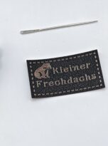 Kunstlederlabel „kleiner Frechdachs“