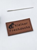 Kunstlederlabel „kleiner Frechdachs“