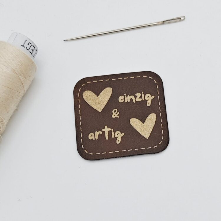 Kunstlederlabel "einzig und artig"