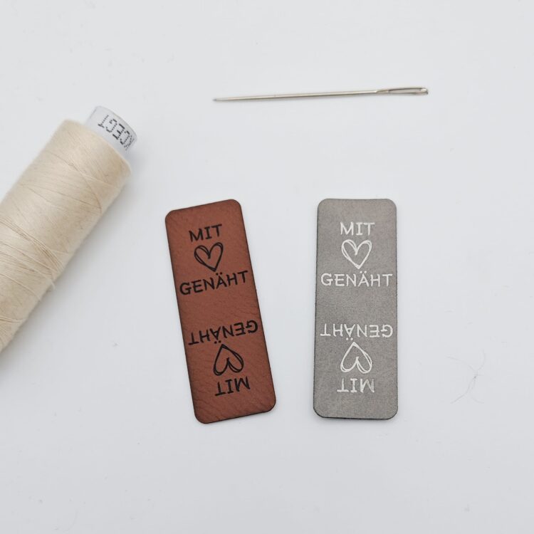 Kunstlederlabel "Knicklabel mit Herz genäht"