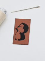 Kunstlederlabel „Pinguin“