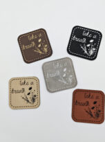 Kunstlederlabel „take a breath“